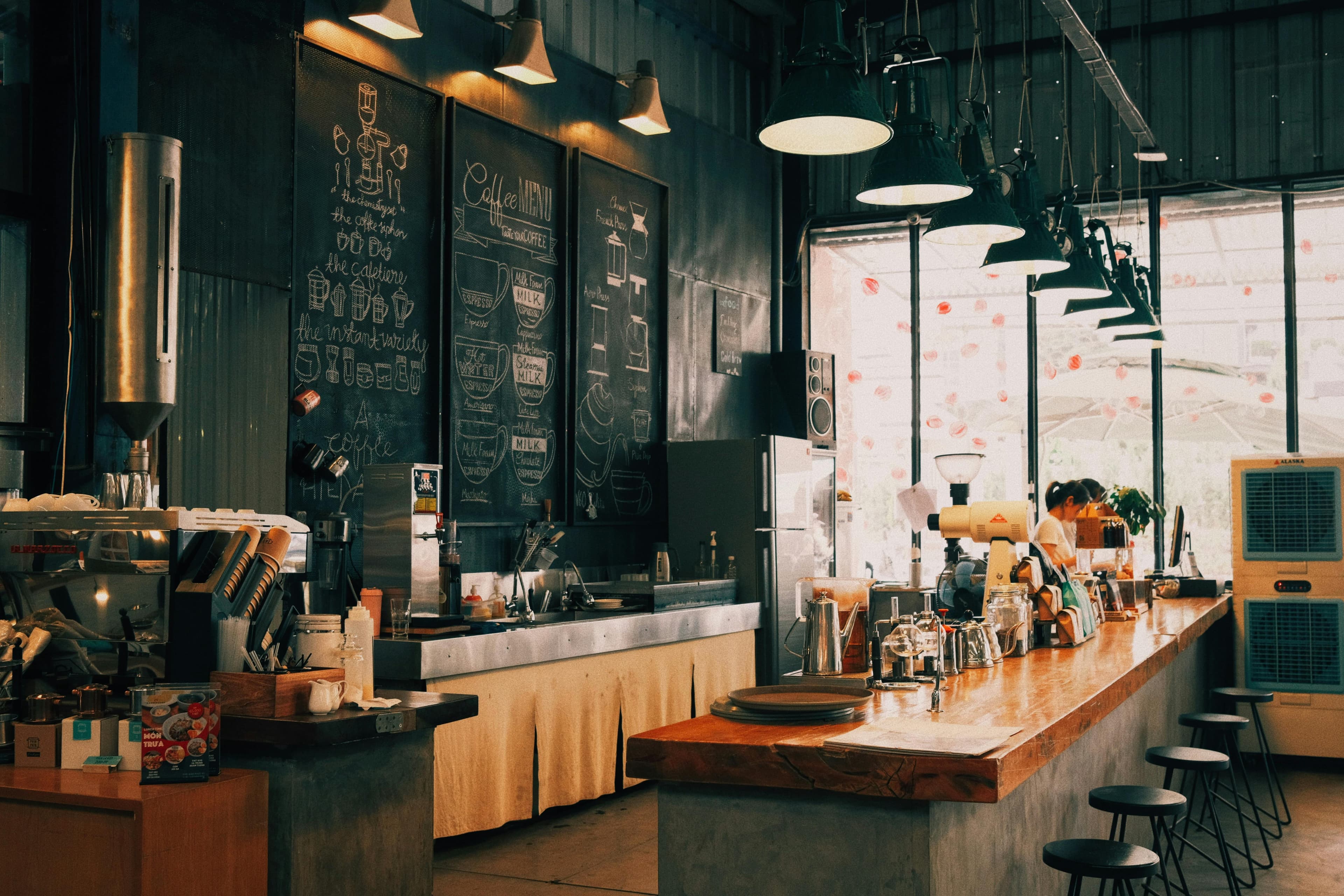 Cafe counter with menu boards and ordering area